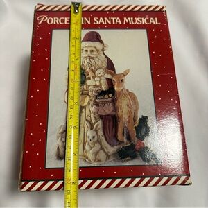 Porcelain Santa Musical Figurine working